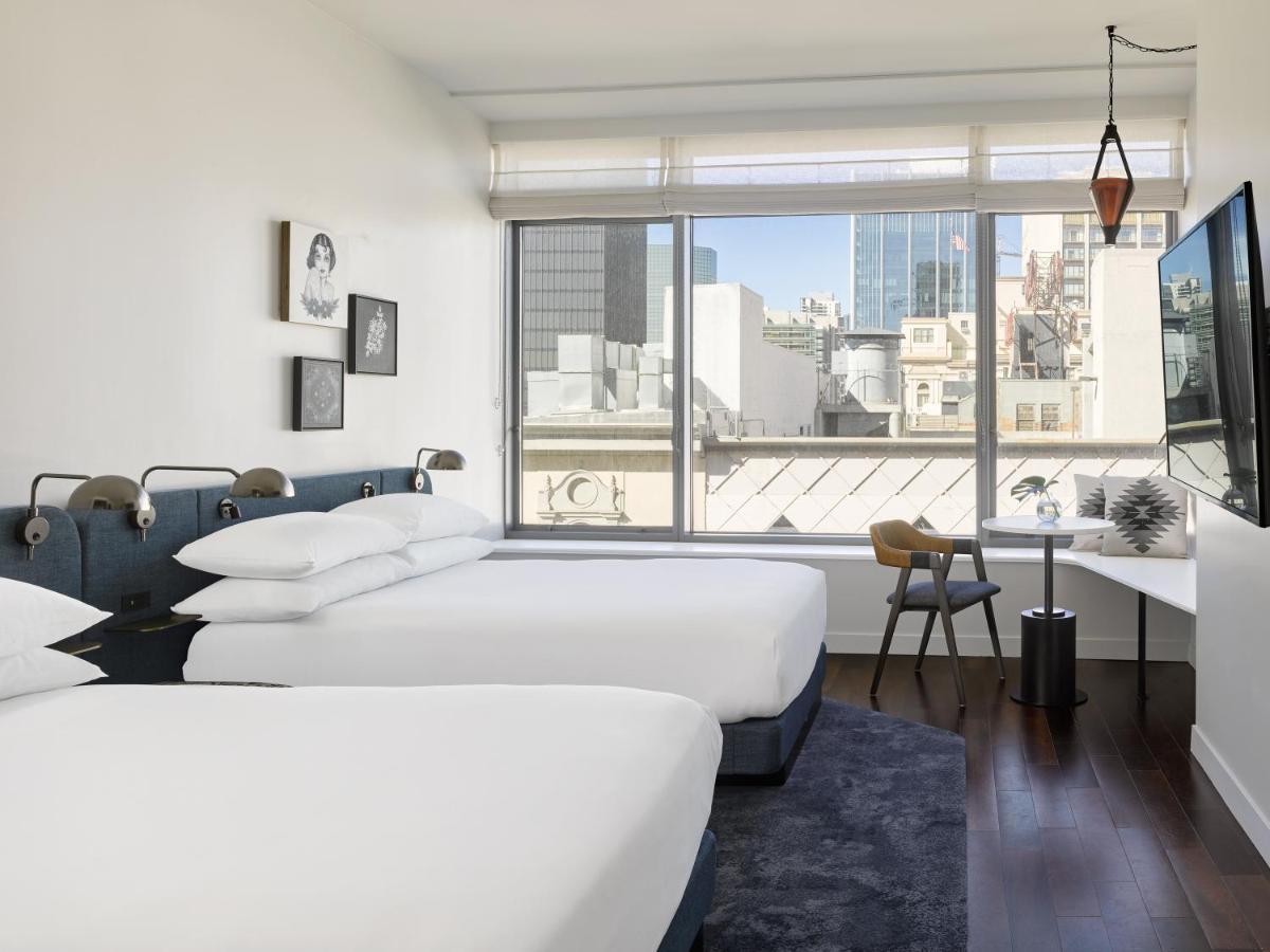 Quarto Premium com 2 Camas de Casal